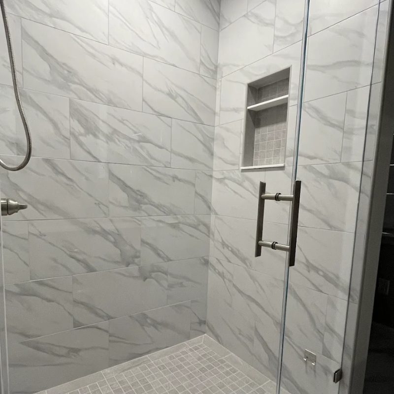 custom tile shower with wall tile and floor tile