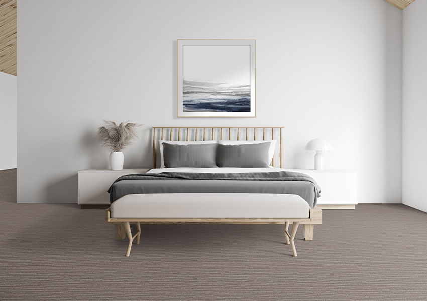 brown patterned carpet in bedroom